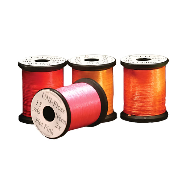 Four spools of UNI Floss Neon in bright neon colors, arranged in a line on a white background.