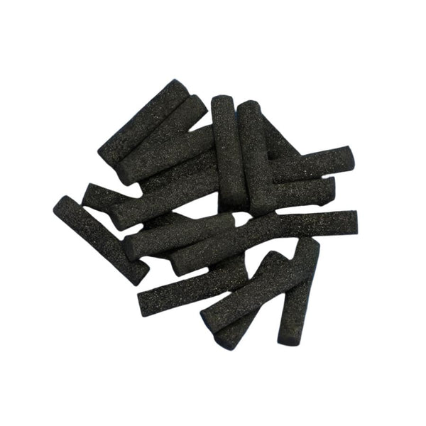 A pile of black foam veniard brand booby eyes cylinders for fly tying on a white background.