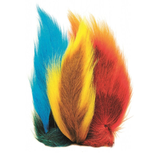 Three different brightly colored Veniard Full Bucktails used for fly tying on a white background.