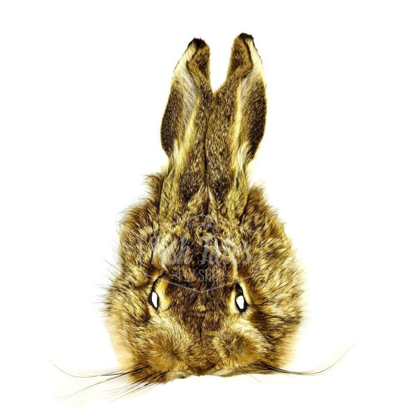 A natural tan Hare's Mask used for fly tying, on a white background.