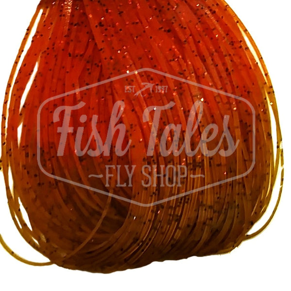 Pumpkin with orange Fire Tip Wapsi Sili Legs for fly tying shown close up on a white background.