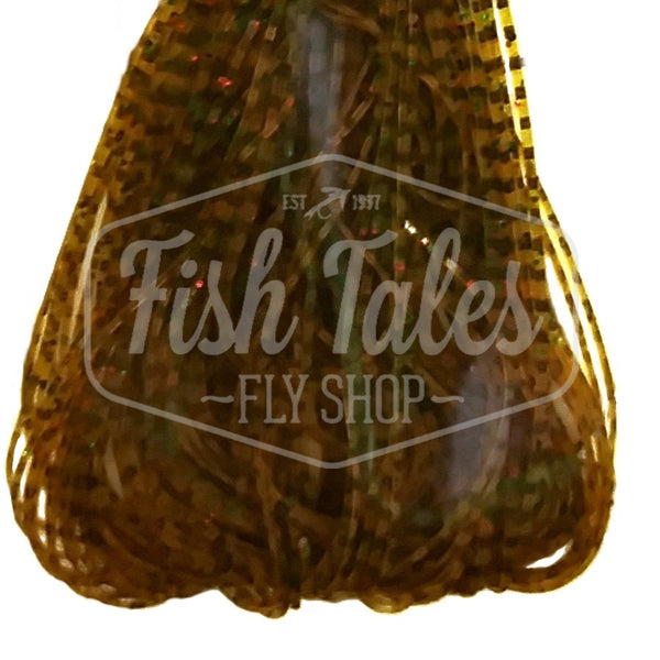 Pumpkin, olive and orange black Perfectly Barred Nymph Size Wapsi Sili Legs for fly tying shown close up on a white background.