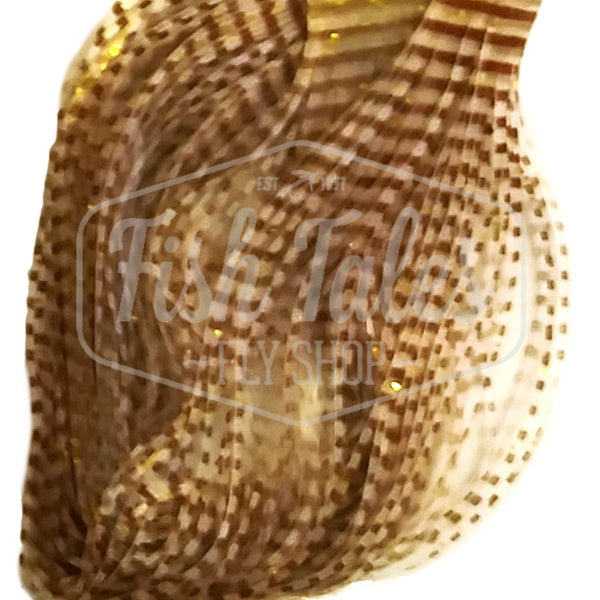 Sand color Perfectly Barred Nymph  Size Wapsi Sili Legs for fly tying shown close up on a white background.