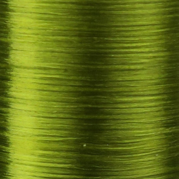 Close up of olive Danville Flat Waxed Nylon fly tying thread.