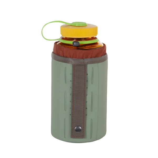 The back of a yucca green Fishpond Thunderhead Water Bottle Holder  showing the attachment strap and a bottle inside against a white background.