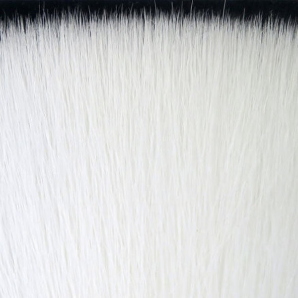 Close-up of white Fly Men Fish Skull Faux Bucktail synthetic fly tying material.