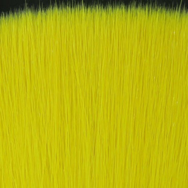 Close-up of yellow Fly Men Fish Skull Faux Bucktail synthetic fly tying material.