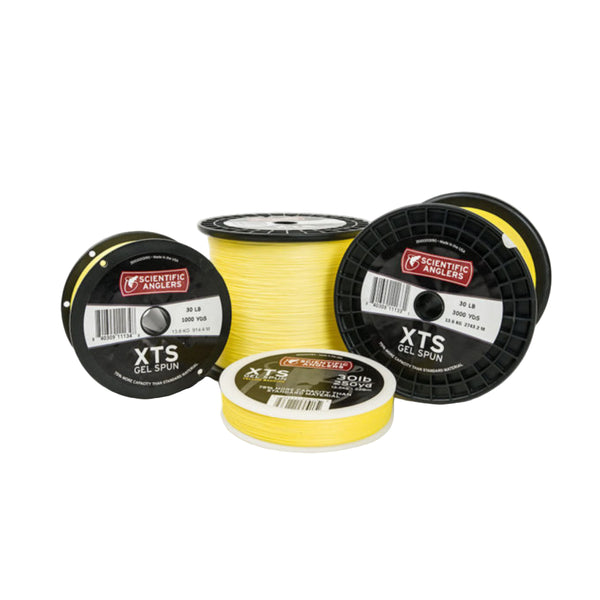 Bulk spools of gel spun backing in yellow and white, designed for saltwater fishing on a 