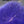 Close up of dyed purple arctic fox tail fur used for fly tying.