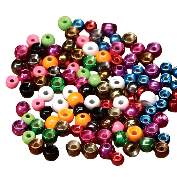 A large group of multicolored cyclops tungsten beads for fly tying on a white background.