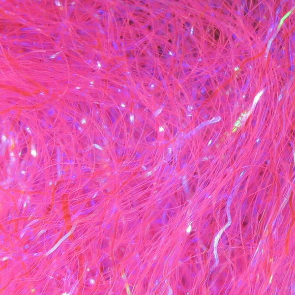 A close-up image of pink Hareline Ripple Ice Fiber, showing the shiny and characteristically crinkled strands.