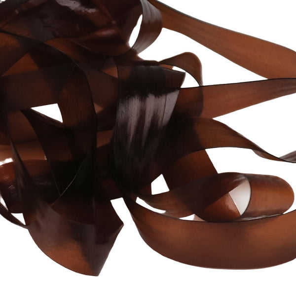 Brown color strip of semi-transparent and stretchy Hareline Scud Back fly tying body material, on a white background.