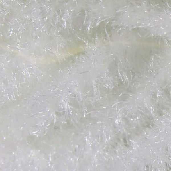 A close-up image of white Hareline Trilobal Antron Chenille for fly tying, showing the texture and material detail.