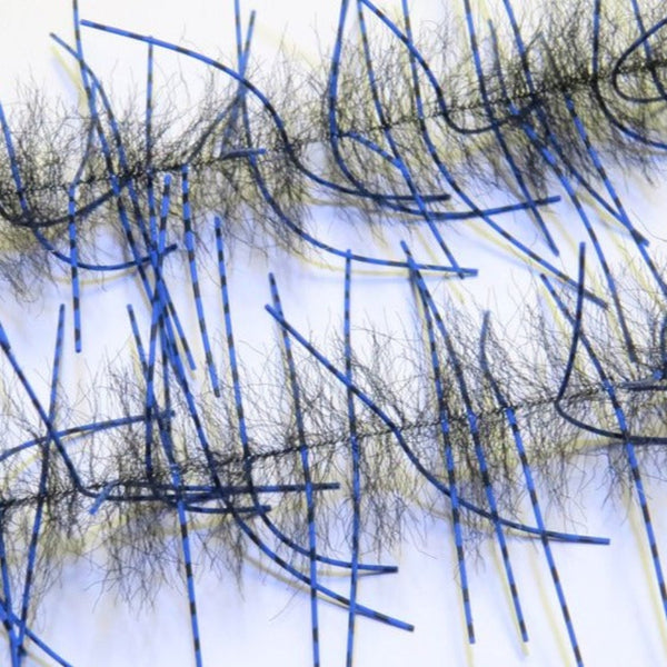 A pair of Just Add H2O Lively Legs Crustacean Brush in black blue with black bar on a white background.