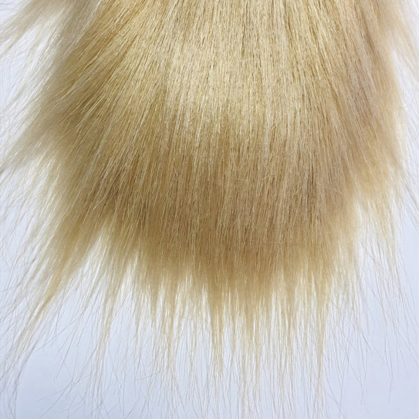 Tan H2O Premium Craft Fur for use in fly tying on a white background.