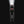 The Nebo swyvel flashlight illuminated on a dark background.