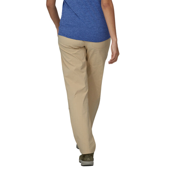 Person wearing husk tan Patagonia Women's Quandary Pant on a white background.