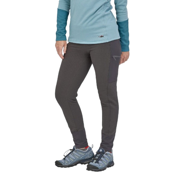 Person wearing Patagonia Women's R2 TechFace Pants in gray color on a white background.