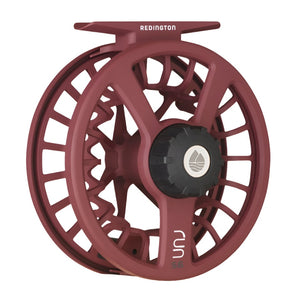 Burgundy color Redington Run Fly Reel on a white background.