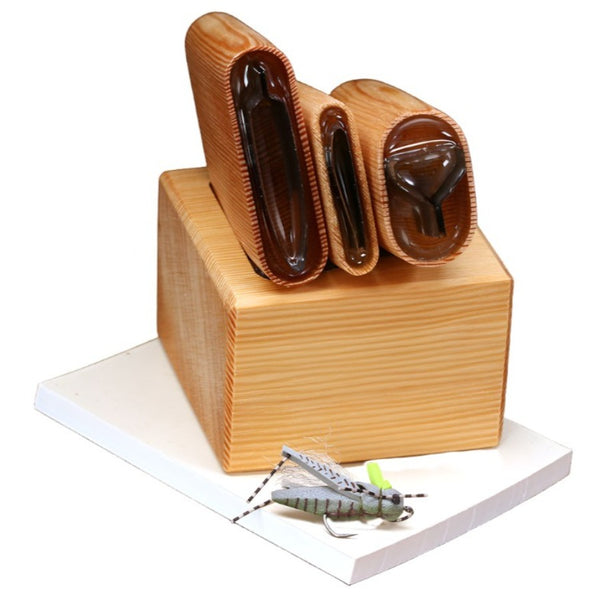 A set of River Road Creations Project Hopper Foam Cutters, shown with the cutting pad and an example Project Hopper dry fly, against a white background. 