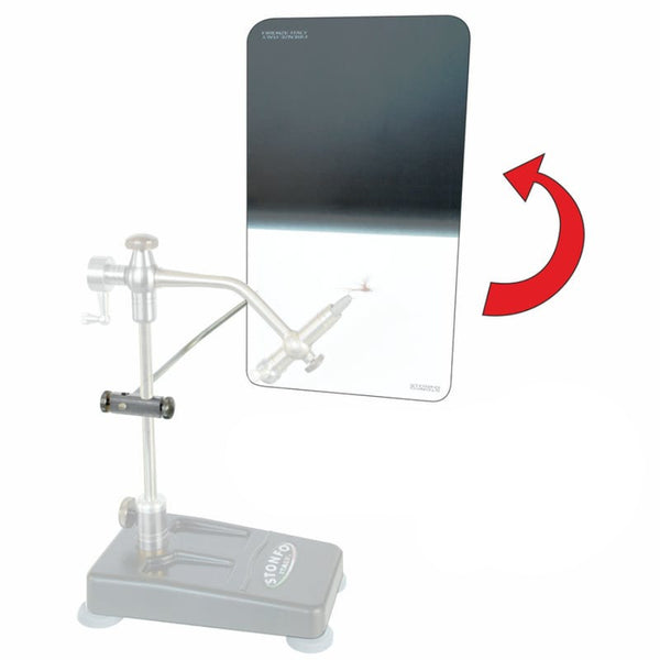 A Stonfo profile plate for fly tying, with a black and white color scheme, a magnetic rest device, and a non-reflective surface. The image also depicts a red arrow indicating the direction of color change.