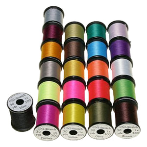 Assortment of UNI Stretch Floss spools in various colors for fly-tying, arranged on a white background.